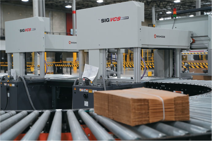 an automatic corrugated squaring bundler for high speed bundling